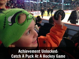 Achievement Unlocked: Catching A Puck At The Hockey Game