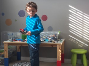 Charlie playing LEGO