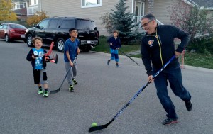 Road Hockey with the neighborhood kids